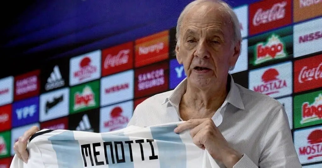 Cesar Luis Menotti Receiving An Argentina Shirt In A Press Conference