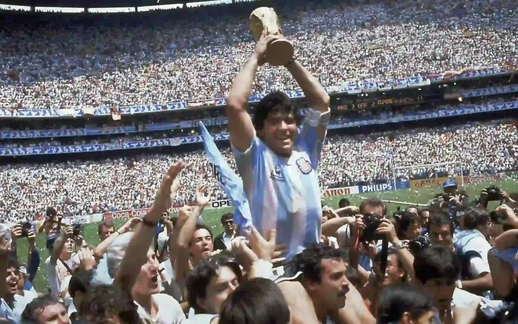 Maradona lifting the trophy following the win over West Germany in the 1986 World Cup in Mexico