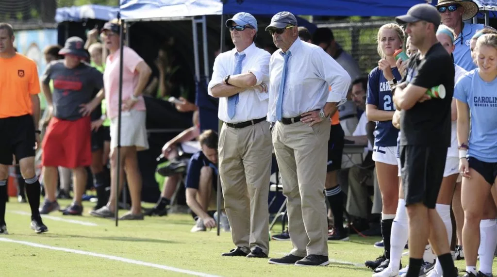 anson dorrance coaching from the sidelines