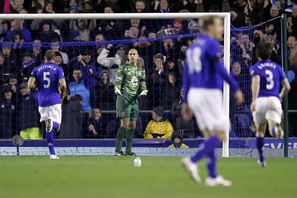 Tim Howard standing is disbelief after scoring a goal for Everton