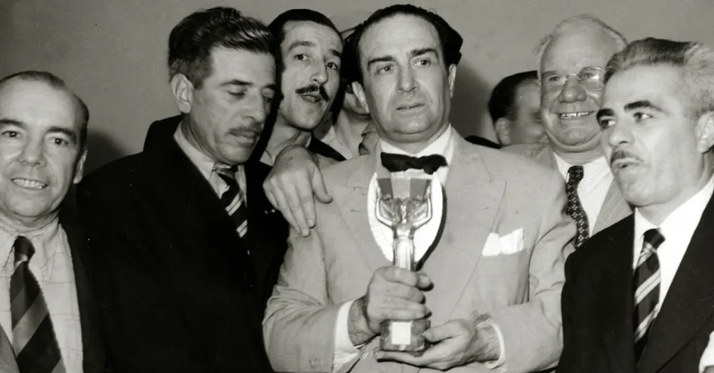 Uruguay Giordano Eccher holds the Jules Rimet trophy