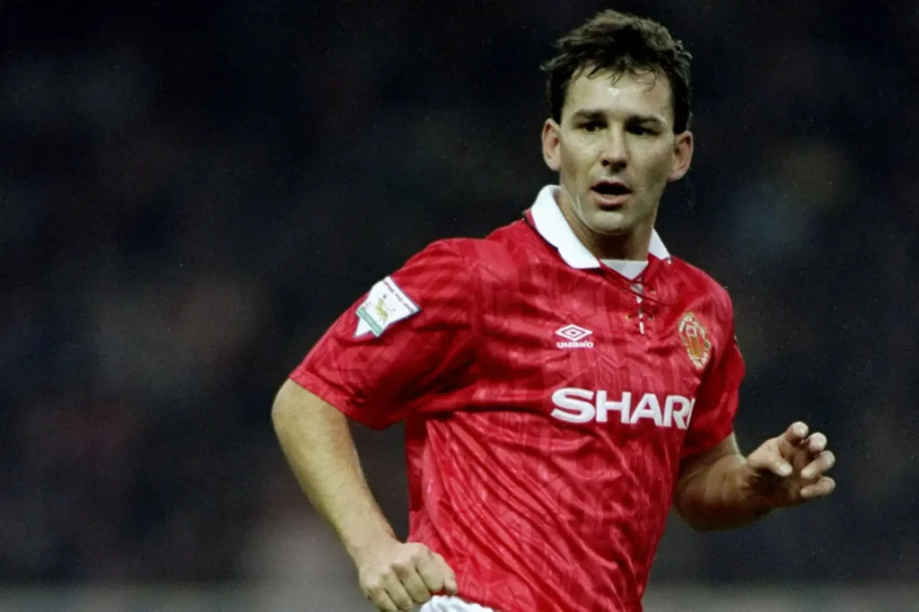 bryan robson moving into position to accept a pass