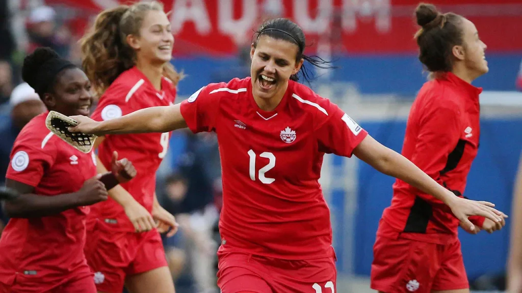 canadian women's soccer international christine sinclair celebrating a win