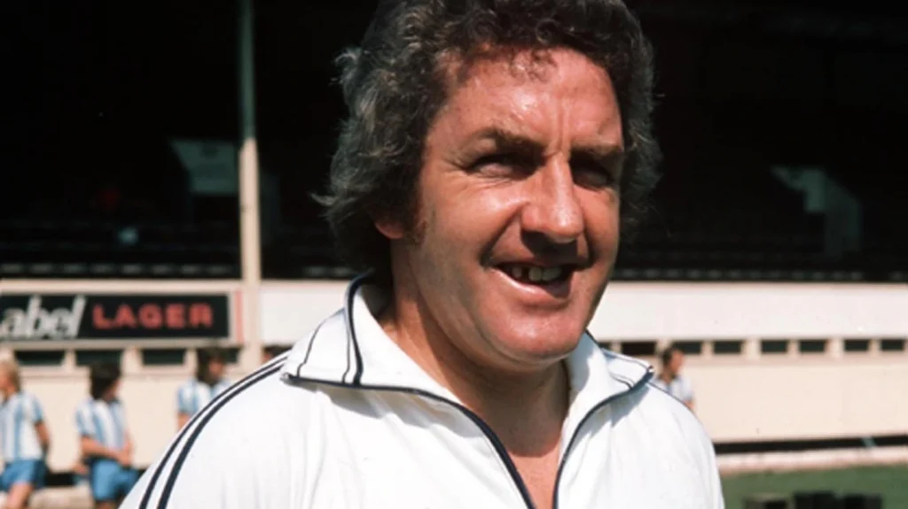 dave mackay with a smile on his face while managing derby county