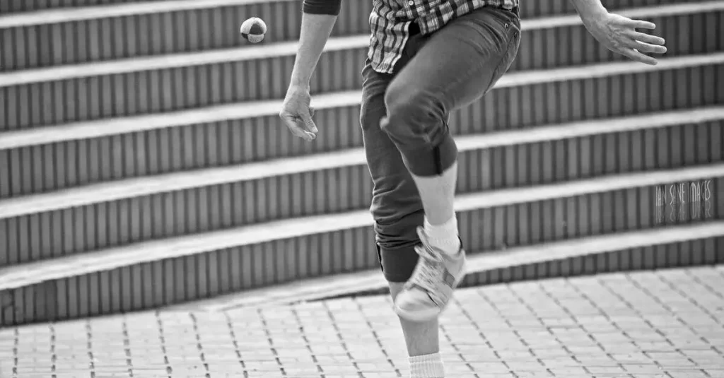 boy playing with his hacky sack