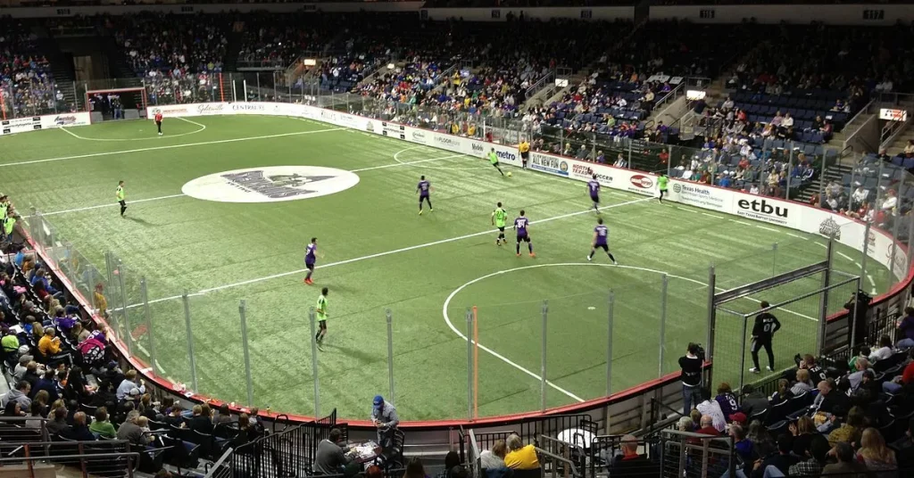 a professional soccer game being played indoors