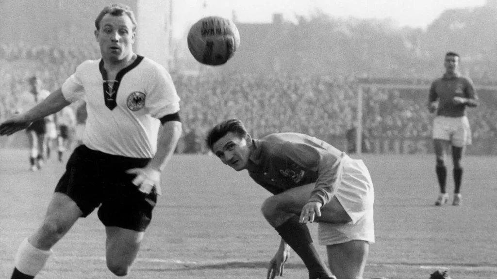 west germany seeler beating a defender