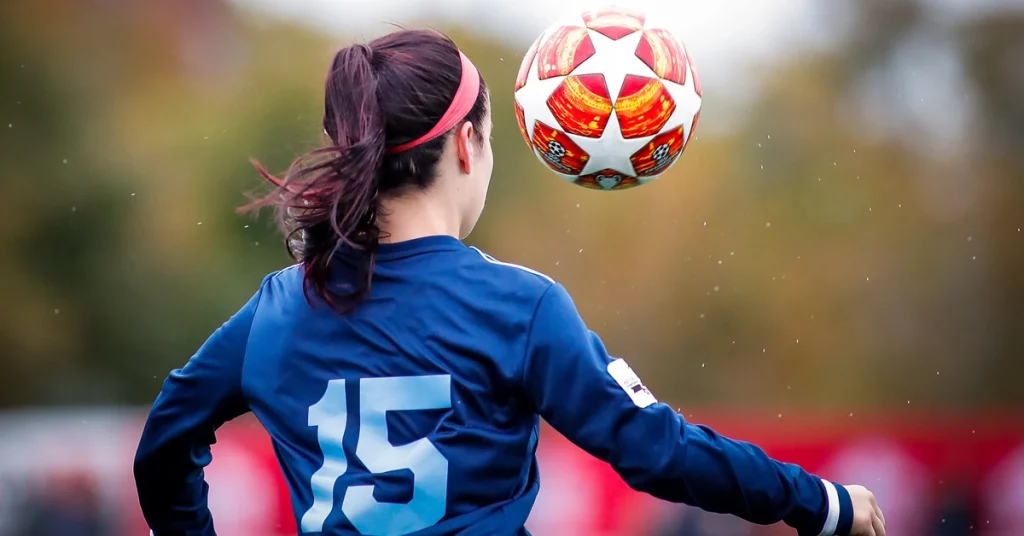 Girl controlling a soccer ball