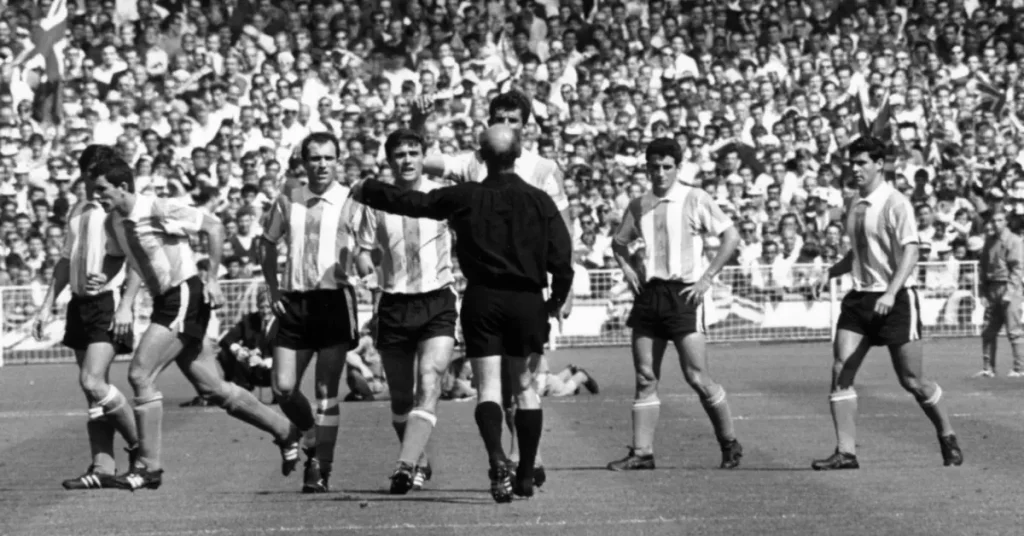 argentina players surrounding the referee in 1966