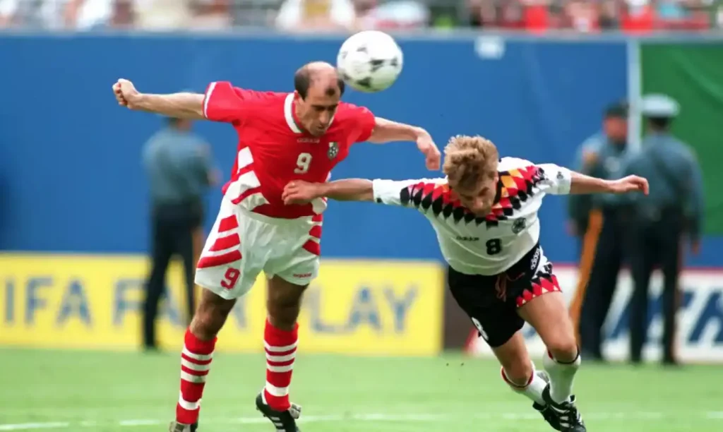 Yordan Letchkov heads the soccer ball in world cup game vs germany