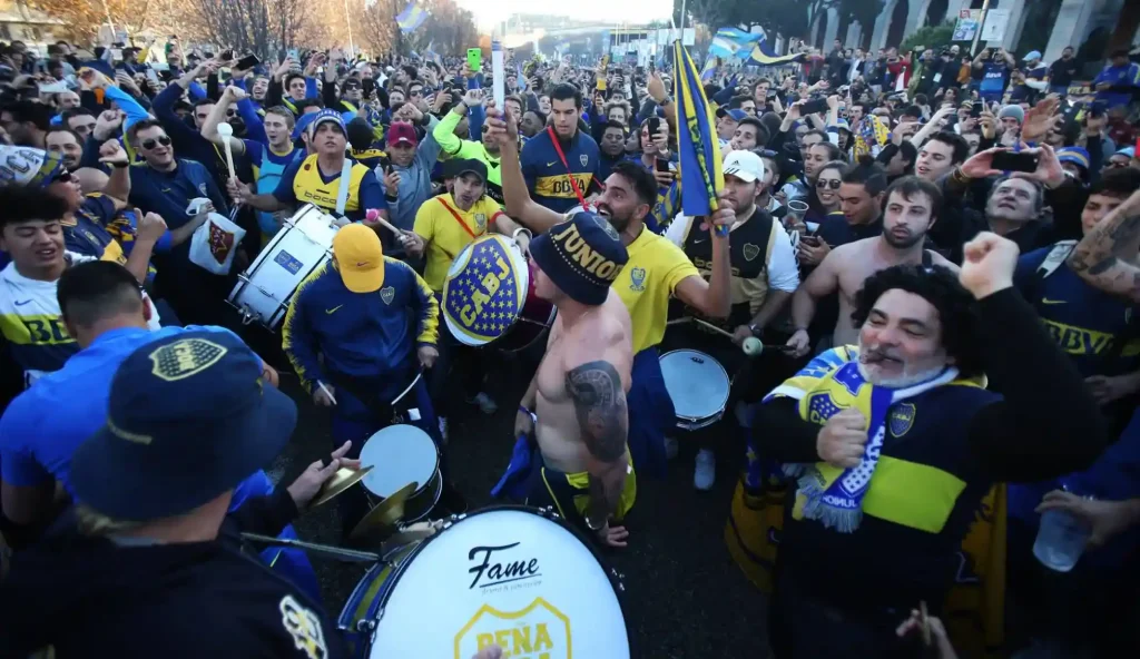 boca juniors supporters singing on the way to the match