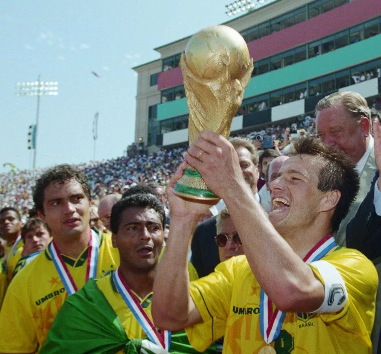 dunga holding the world cup trophy