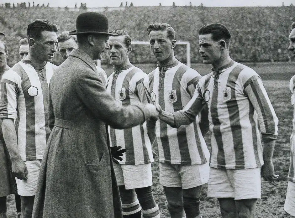 huddersfield players lining up before a match