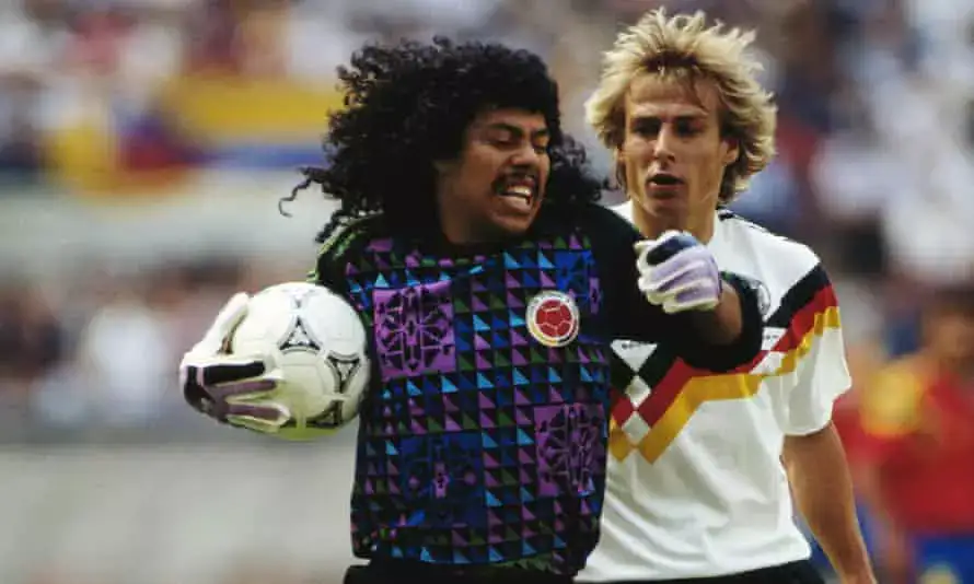 Rene Higuita colombia goalkeeper catching the ball in front of jurgen klinsman