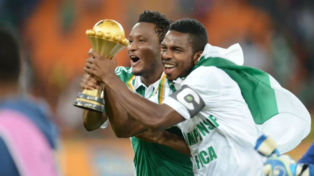 john obi mikel and jospeh yobo with african championship trophy