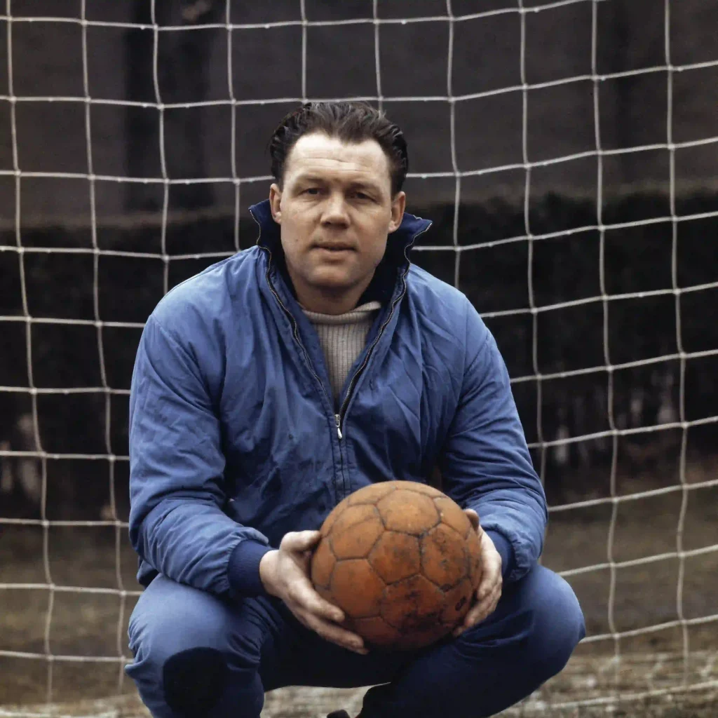 michel rinus holding a football