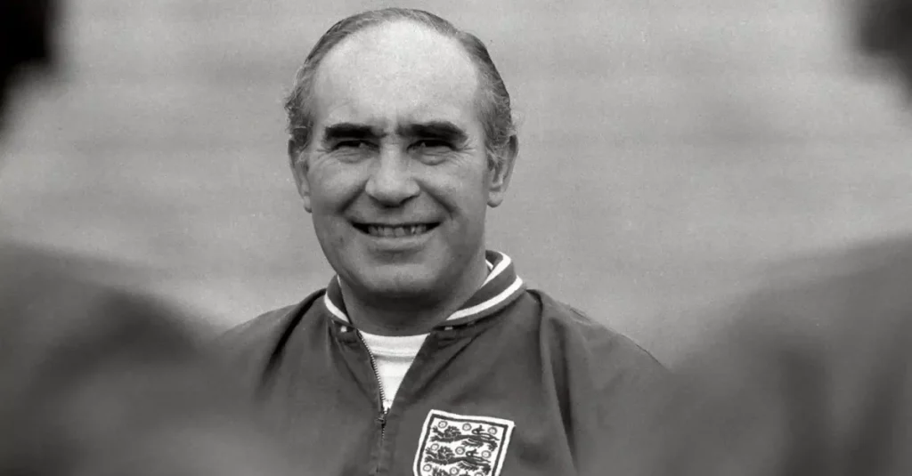 alf ramsey smiling towards his playing when taking england training