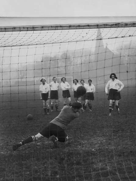 women taking penalty kicks