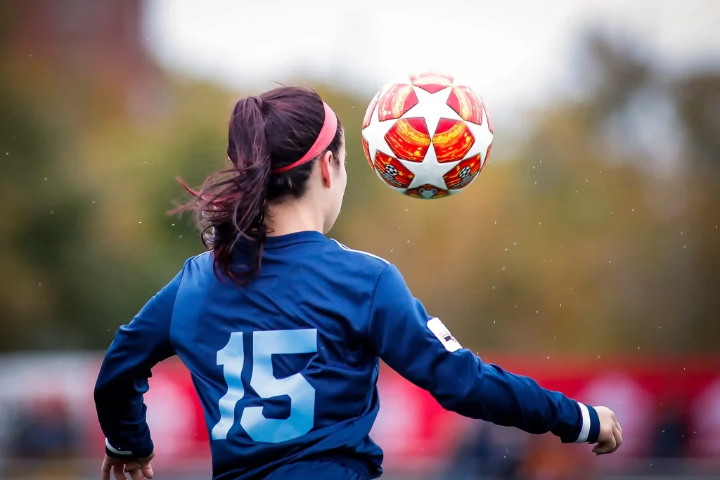 Girl controlling a soccer ball