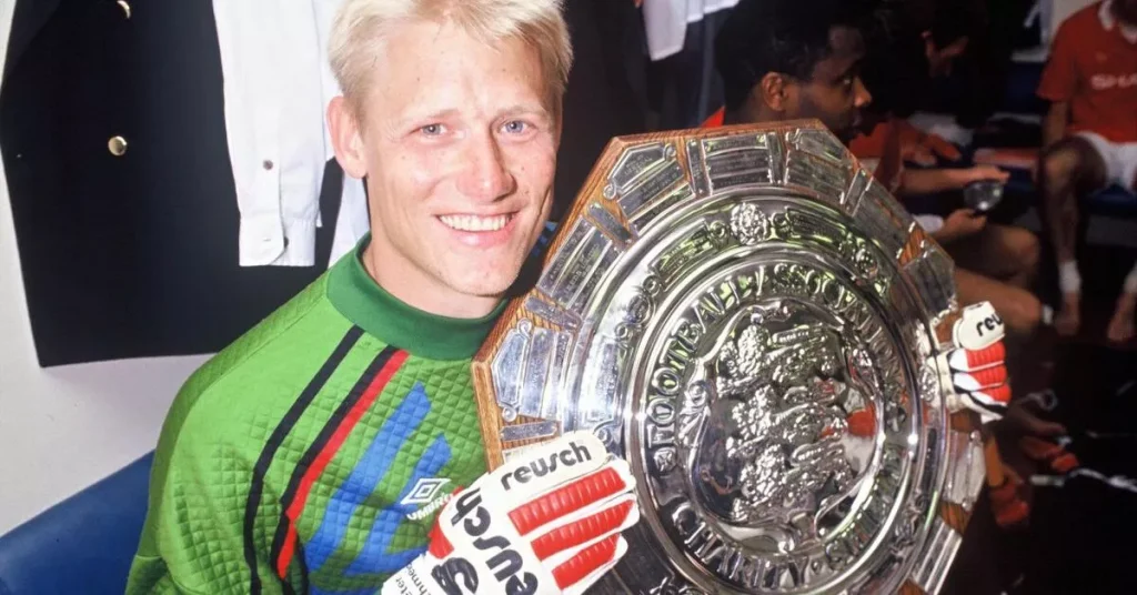 Peter Schmeichel with trophy