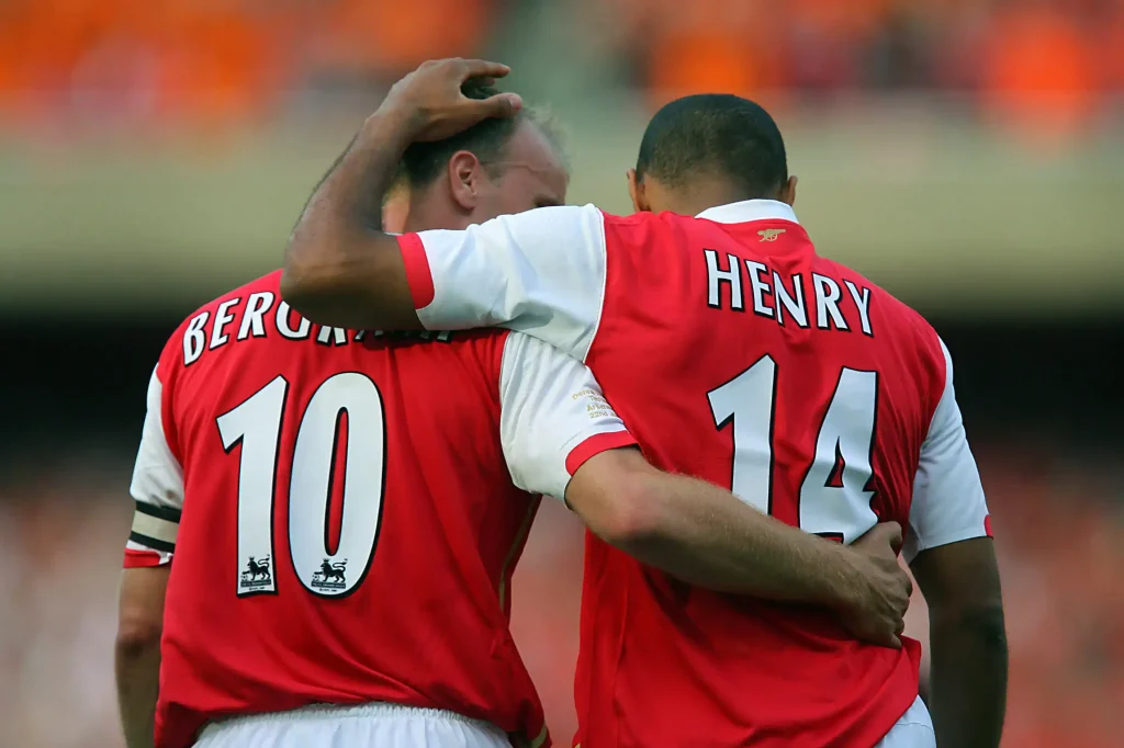 henry and bergkamp celebrating scoring a goal