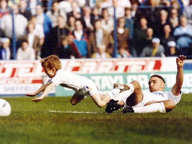 vinnie jones tackling a mascot