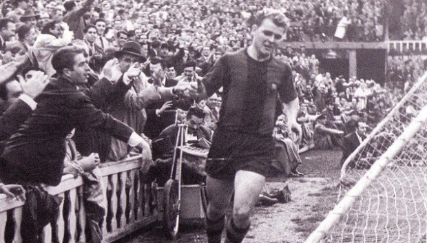 Kubala celebrating with fans after scoring a goal