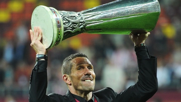 Simeone with trophy