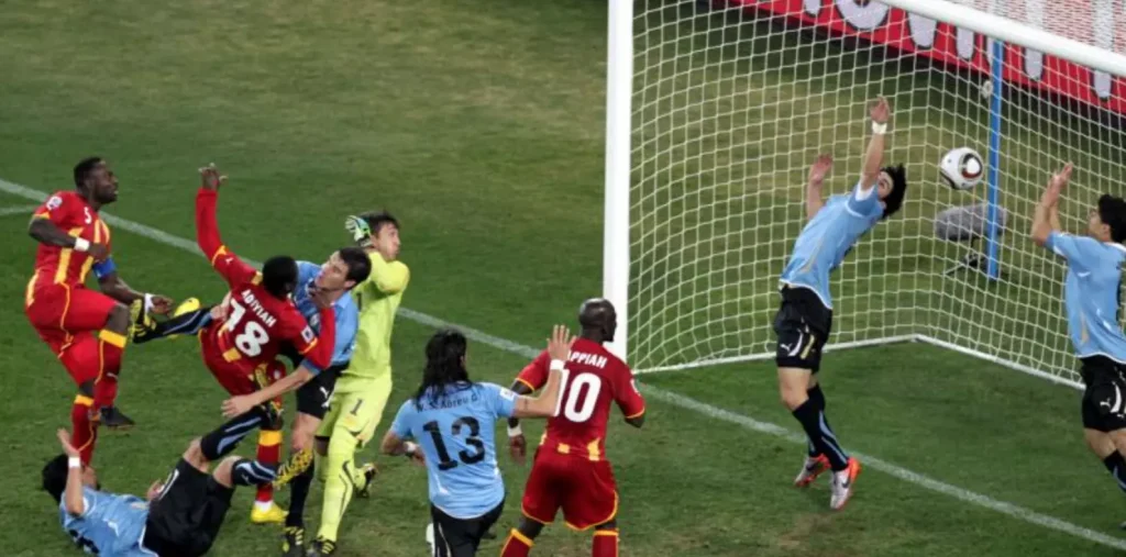 luis suarez saving ball in world cup