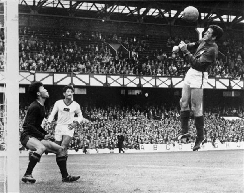 Eusebio scoring a header against North Korea 1966