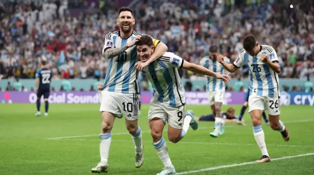 argentina players celebrate a goal in semi final