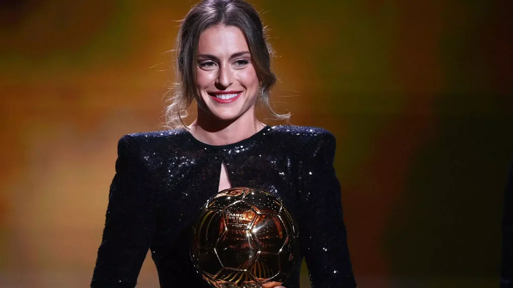 Alexia Putellas winning the 2021 ballon d'or trophy for best women's soccer player